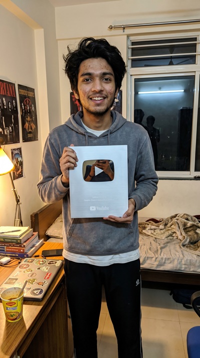 Student with Silver Play Button