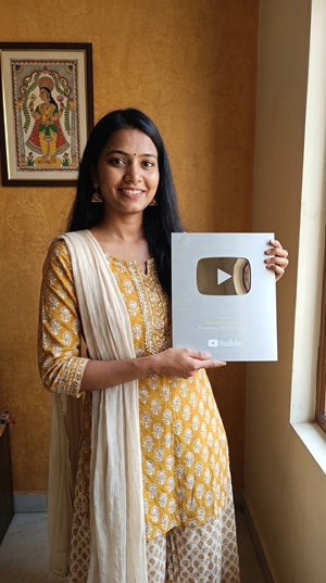 Student with Silver Play Button